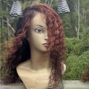 100% human hair 
All New and colored by me Auburn and Black Wig